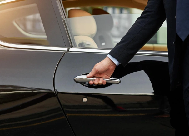 Driver opening door to private car